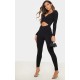 Black Rib Cross Over Long Sleeved Jumpsuit Black Rib Cross Over Long Sleeved Jumpsuit