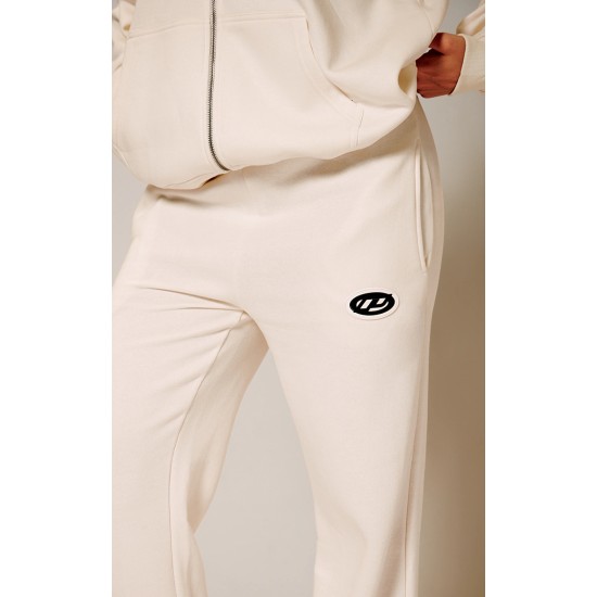 PRETTYLITTLETHING Cream Contrast Logo Badge Wide Leg Sweatpants PRETTYLITTLETHING Cream Contrast Logo Badge Wide Leg Sweatpants