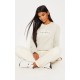 PRETTYLITTLETHING Sand Graphic Oversized Fit Sweatshirt PRETTYLITTLETHING Sand Graphic Oversized Fit Sweatshirt