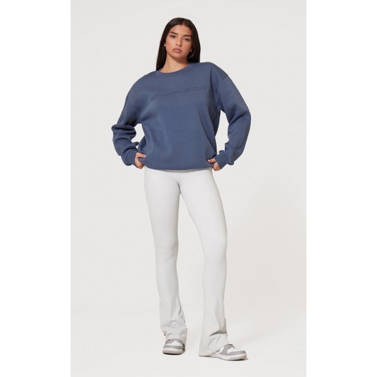PRETTYLITTLETHING Petrol Blue Athletics Club Embossed Oversized Boxy Sweatshirt PRETTYLITTLETHING Petrol Blue Athletics Club Embossed Oversized Boxy Sweatshirt