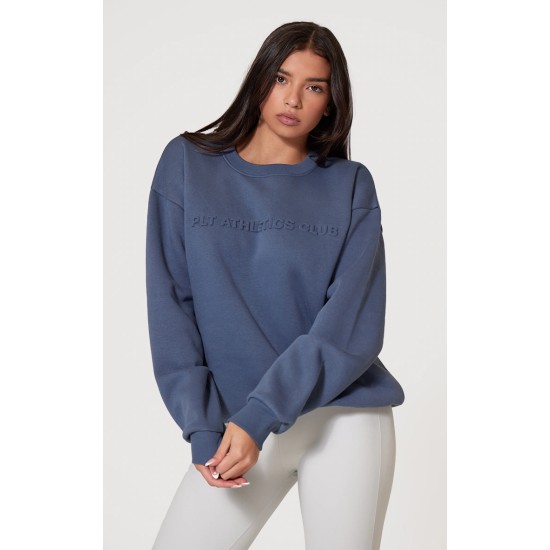 PRETTYLITTLETHING Petrol Blue Athletics Club Embossed Oversized Boxy Sweatshirt PRETTYLITTLETHING Petrol Blue Athletics Club Embossed Oversized Boxy Sweatshirt