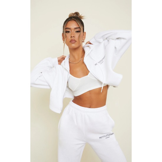 PRETTYLITTLETHING White Copyright Graphic Zip Through Crop Hoodie PRETTYLITTLETHING White Copyright Graphic Zip Through Crop Hoodie