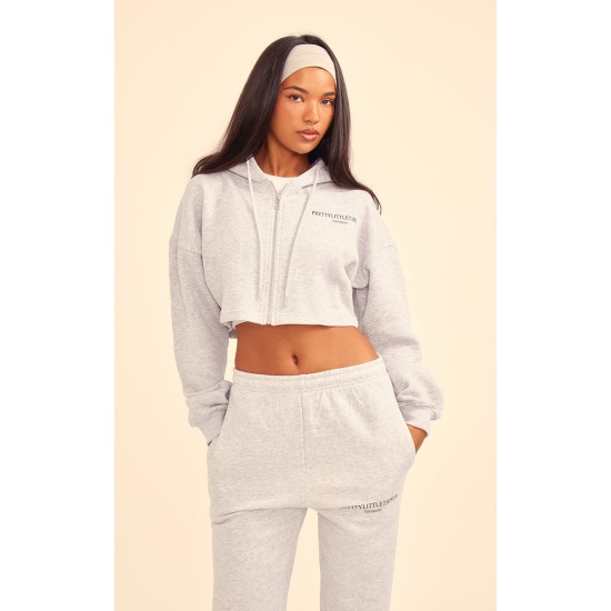 PRETTYLITTLETHING Grey Marl Copyright Graphic Zip Through Crop Hoodie PRETTYLITTLETHING Grey Marl Copyright Graphic Zip Through Crop Hoodie